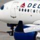 Delta Air Lines says cancellations continue as it tries to restore operations after tech outage