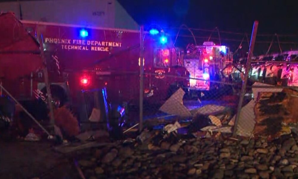 Storms cause roof collapse at Phoenix commercial building, 1 unaccounted for