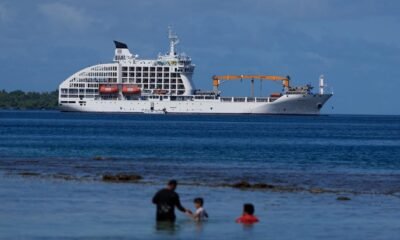 A first for the Games, Olympic surfers sleep on a cruise ship in Tahiti