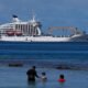 A first for the Games, Olympic surfers sleep on a cruise ship in Tahiti