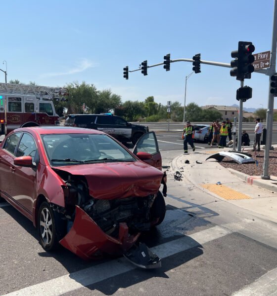 A red Nissan Sentra is totaled on John Wayne Parkway near Alterra Parkway after witnesses say it ran a red light and struck a sports coupe at 3:15 p.m. July 24, 2024. [Brian Petersheim Jr.]