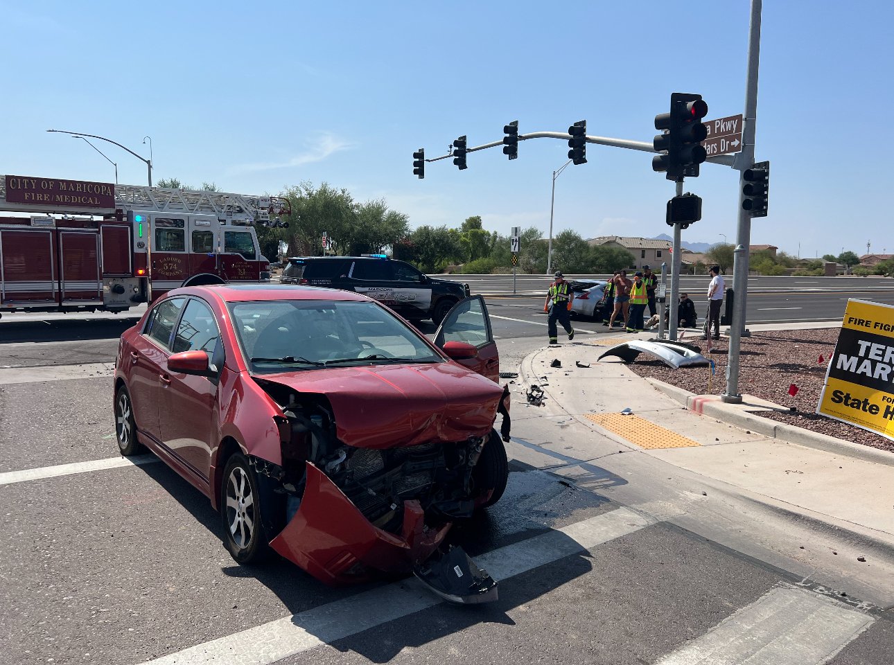 A red Nissan Sentra is totaled on John Wayne Parkway near Alterra Parkway after witnesses say it ran a red light and struck a sports coupe at 3:15 p.m. July 24, 2024. [Brian Petersheim Jr.]