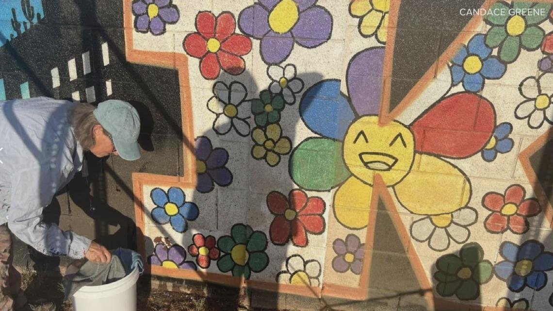 Vandalized kindness mural in Phoenix restored by community