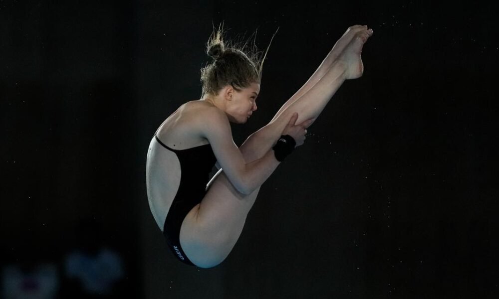 Why do divers shower after they dive at the Paris Olympics?