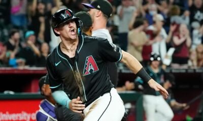 Diamondbacks take lead on back-to-back wild pitches, rally for 5-4 win over the Rockies