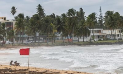 Ernesto has intensified into a hurricane and is on a path toward Bermuda, forecasters say