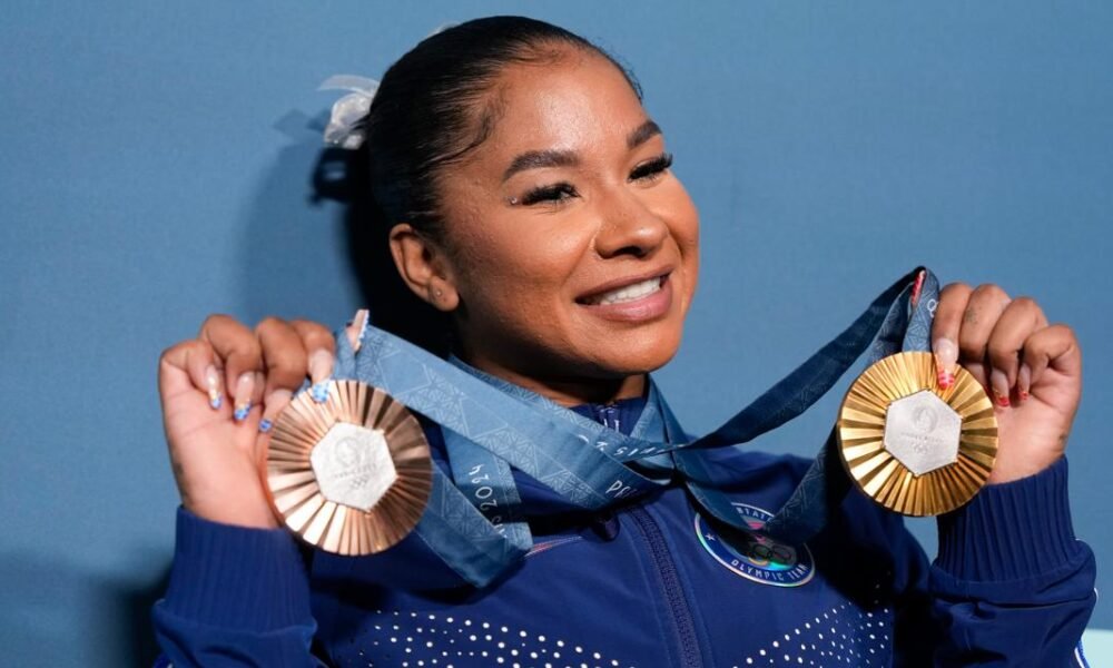 Flavor Flav offers Jordan Chiles a unique piece of bling to replace bronze medal