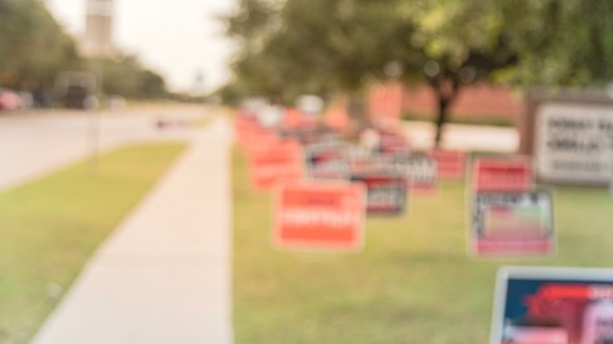 blurred yard signs