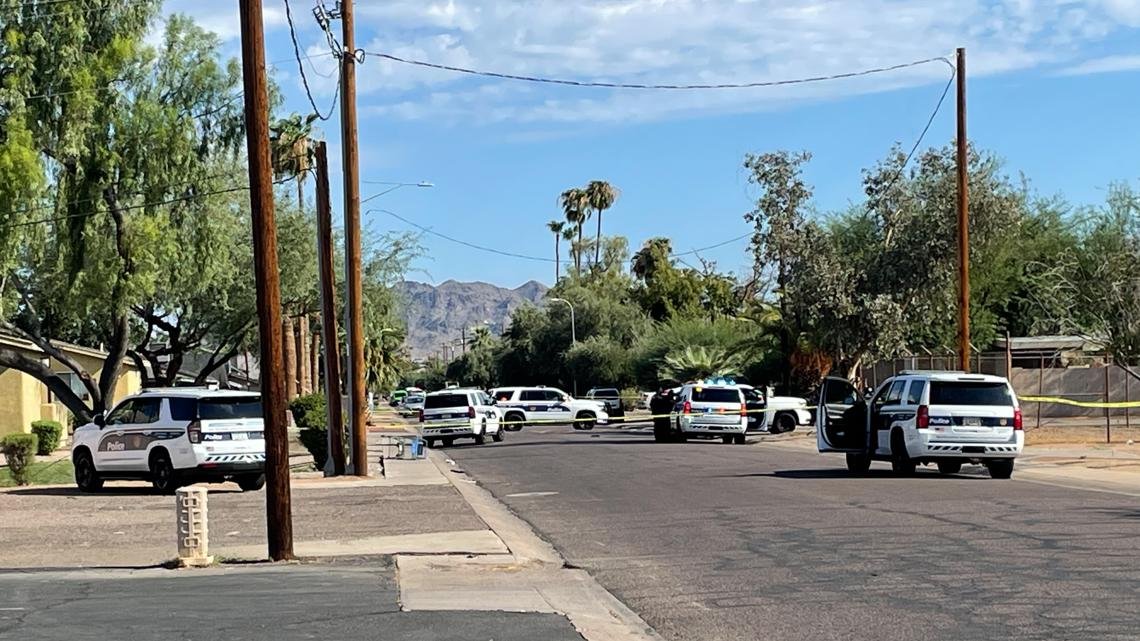 1 man is dead, 1 is fighting for his life and the suspect is still at large after a shooting at a construction site in Phoenix