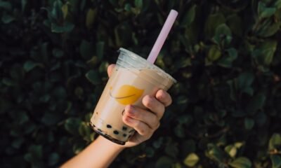 An image of a person holding a cup of boba tea. [RDNE/Pexels]