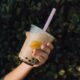 An image of a person holding a cup of boba tea. [RDNE/Pexels]