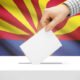 ballot box with Arizona flag in background