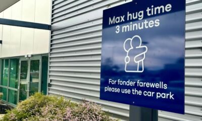 A New Zealand airport wants you to hug goodbye faster