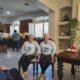 Seeing double: 85-year-old fraternal twins wear matching outfits to Thanksgiving dinner