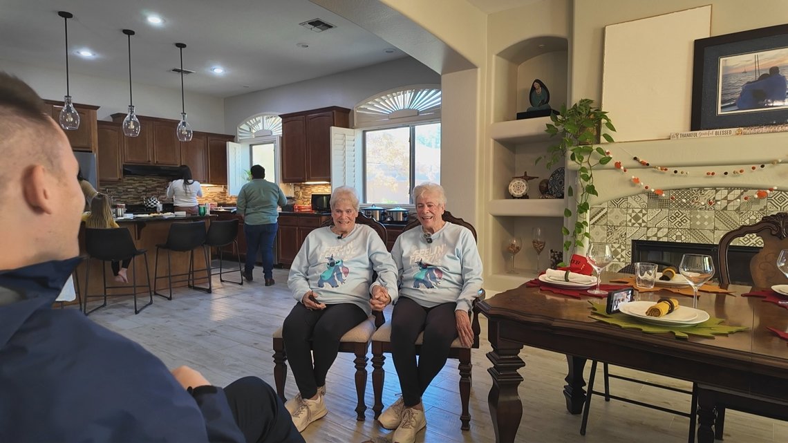 Seeing double: 85-year-old fraternal twins wear matching outfits to Thanksgiving dinner