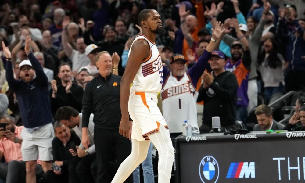 Kevin Durant lifts Suns past Philadelphia 118-116, spoiling Paul George's 76ers debut