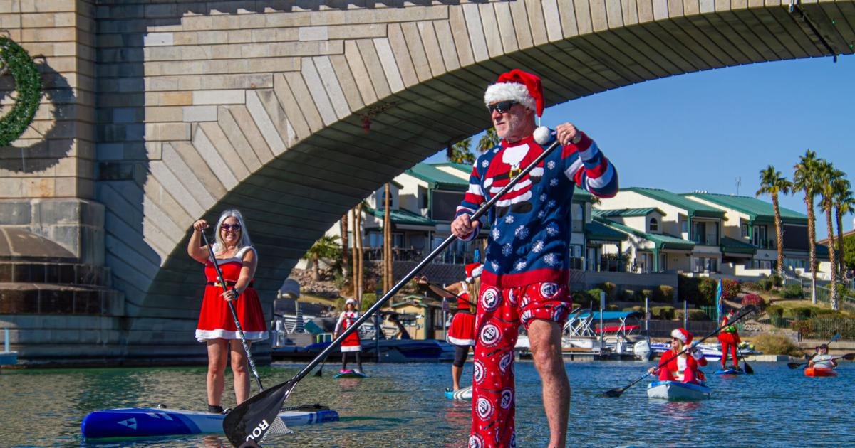 Inaugural 'Santa Paddle' arrives on the channel