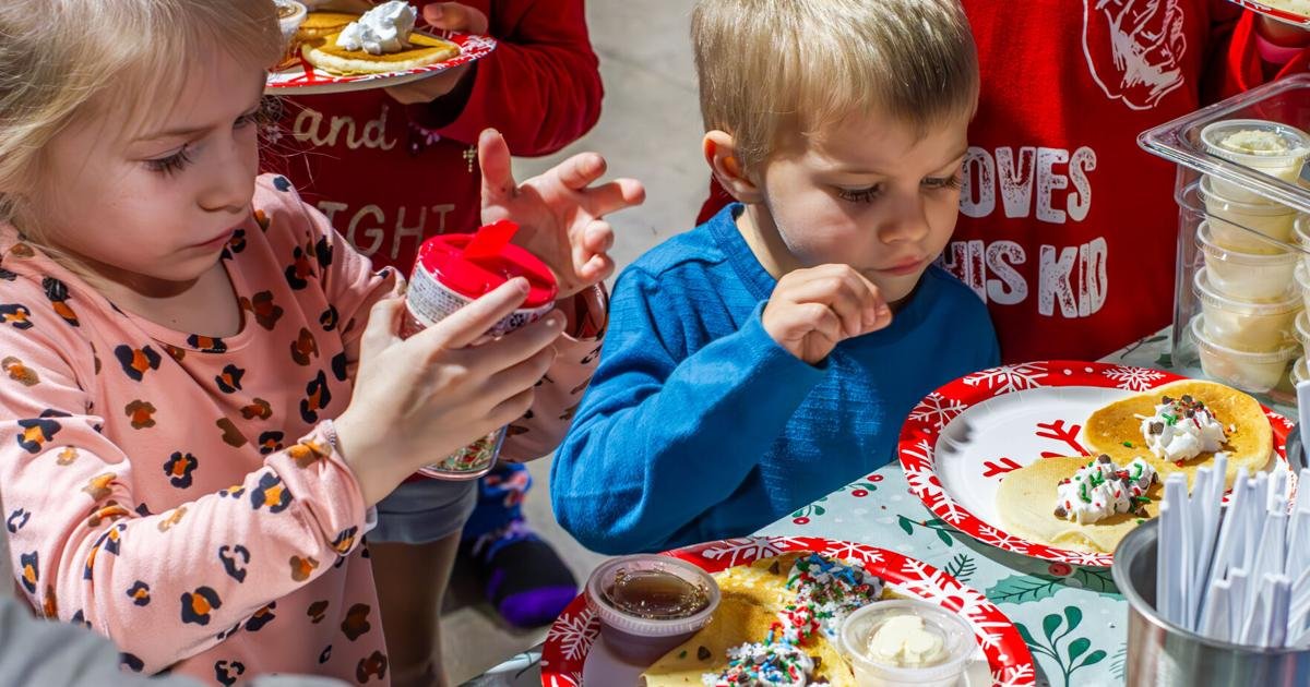 Santa, pancakes greet Havasu youth on Christmas eve