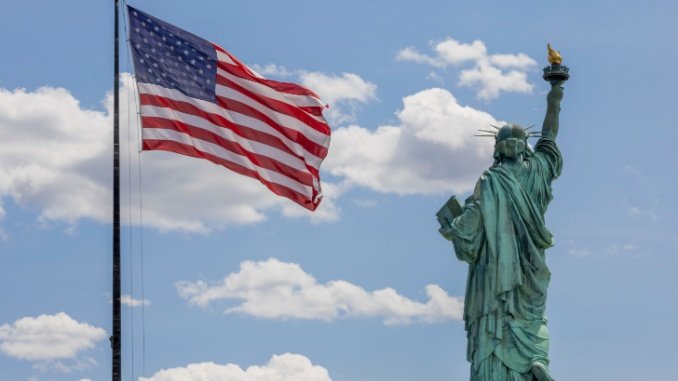 American flag and the Statue of Liberty