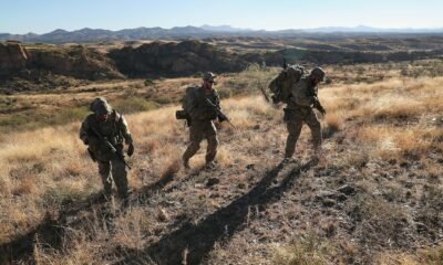 As Trump touts plans for immigrant roundup, militias are standing back, but standing by