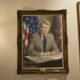 A portrait of former President Jimmy Carter hangs in the Georgia Capitol. Carter, a governor of Georgia from 1971 to 1975, died Sunday. Phot by Ross Williams