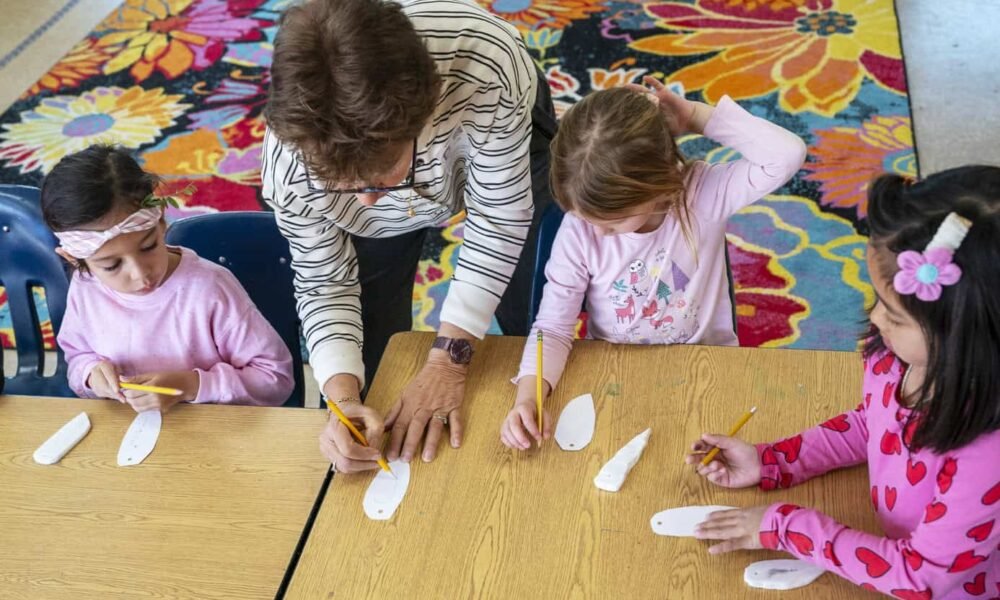 Leanne Lee teaches marble sculpting to students