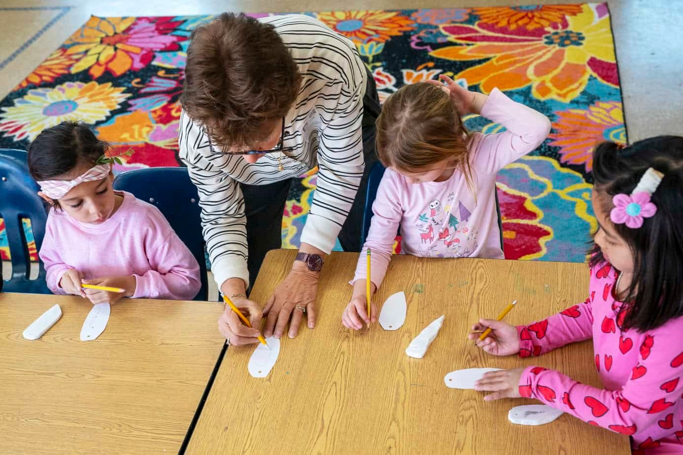 Leanne Lee teaches marble sculpting to students