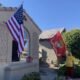 American and Marine flags on home