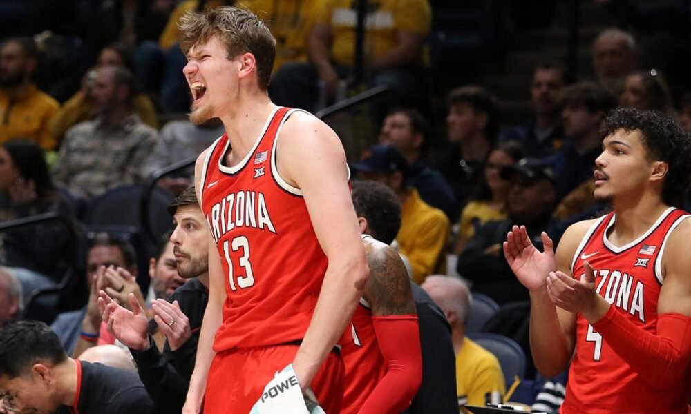 KJ Lewis scores career-high 21 as Arizona beats No. 21 West Virginia 75-56