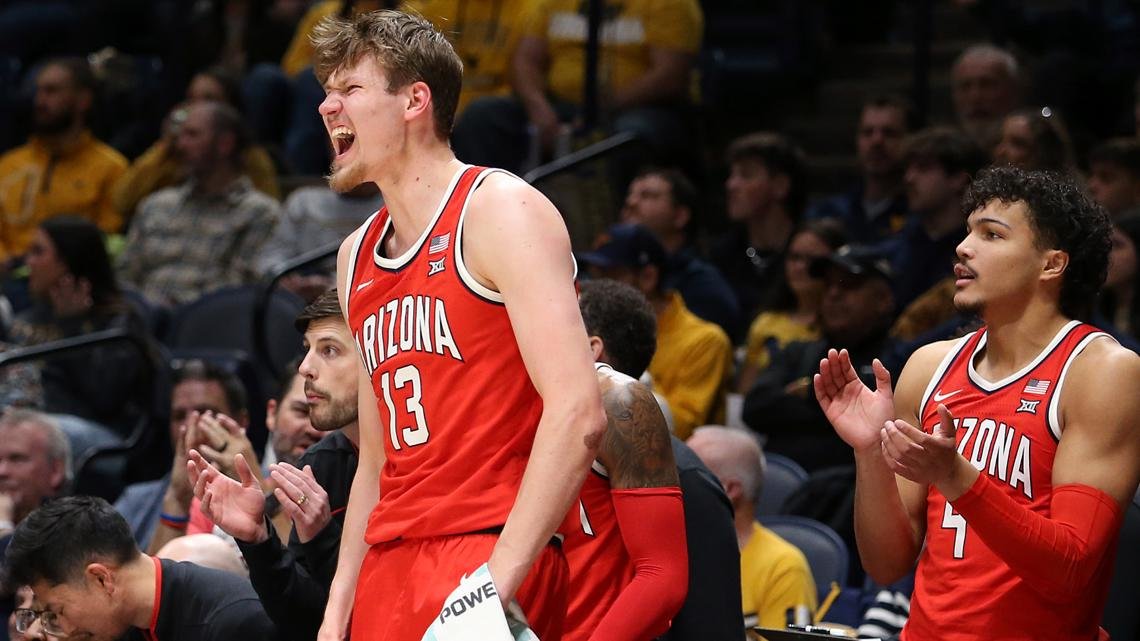 KJ Lewis scores career-high 21 as Arizona beats No. 21 West Virginia 75-56