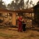 Families in shock begin to visit their charred homes in Los Angeles area