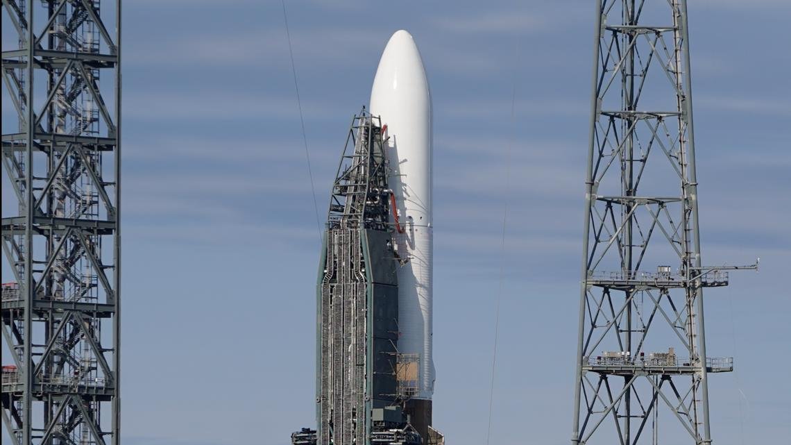 Jeff Bezos' space company calls off debut launch of massive new rocket in final minutes of countdown