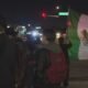 People gather at Phoenix intersection for hours on Sunday evening to protest changes in immigration policies, mass deportations