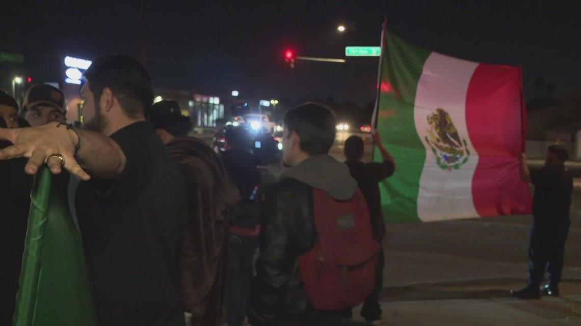 People gather at Phoenix intersection for hours on Sunday evening to protest changes in immigration policies, mass deportations