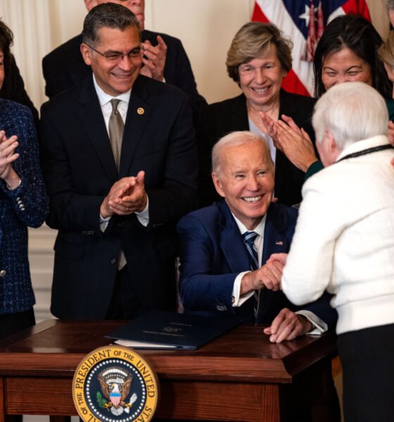 President Joe Biden gives a pen to Bette Marafino, president of the Connecticut Chapter of the Alliance for Retired Americans, after he signed the Social Security Fairness Act during an event in the East Room of the White House on Jan. 5, 2025, in Washington, D.C.  At left are Sen.  Susan Collins, R-Maine, and Health and Human Services Secretary Xavier Becerra.  The legislation will expand Social Security benefits for millions of retired Americans, including firefighters, police officers and teachers. (Photo by Kent Nishimura/Getty Images)