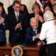 President Joe Biden gives a pen to Bette Marafino, president of the Connecticut Chapter of the Alliance for Retired Americans, after he signed the Social Security Fairness Act during an event in the East Room of the White House on Jan. 5, 2025, in Washington, D.C.  At left are Sen.  Susan Collins, R-Maine, and Health and Human Services Secretary Xavier Becerra.  The legislation will expand Social Security benefits for millions of retired Americans, including firefighters, police officers and teachers. (Photo by Kent Nishimura/Getty Images)