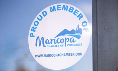 A Maricopa Chamber of Commerce sticker sits on the entrance to InMaricopa's office on Jan. 16, 2025. [Monica D. Spencer]