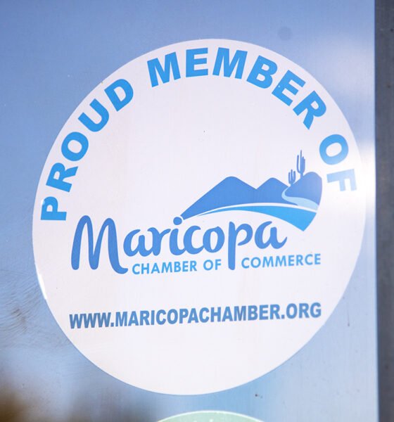 A Maricopa Chamber of Commerce sticker sits on the entrance to InMaricopa's office on Jan. 16, 2025. [Monica D. Spencer]