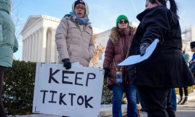 Sarah Baus of Charleston, South Carolina, left, holds a sign that reads "Keep TikTok" as she and other content creators Sallye Miley of Jackson, Mississippi, middle, and Callie Goodwin of Columbia, South Carolina, stand outside the U.S. Supreme Court Building on Jan. 10, 2025, as the court hears oral arguments on whether to overturn or delay a law that could lead to a ban of TikTok in the United States. (Photo by Andrew Harnik/Getty Images)