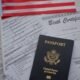 birth certificate, passports, and American flags