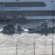 Emergency response units on Jan. 30, 2025, search the crash site of an American Airlines plane on the Potomac River after the plane collided with a military helicopter the previous night on approach to Reagan National Airport in Arlington, Virginia. (Photo by Win McNamee/Getty Images)