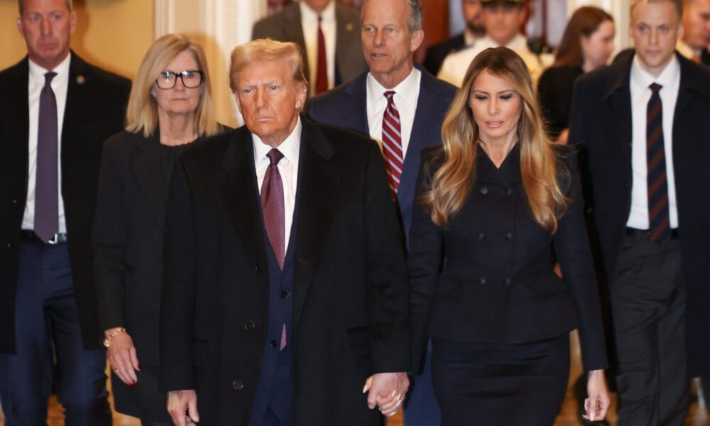 President-elect Donald Trump and wife Melania Trump arrive at the U.S. Capitol on Jan. 8, 2025, ahead of Senate Majority Leader John Thune, center. Trump met with Senate Republicans Wednesday evening. (Photo by Tasos Katopodis/Getty Images)