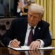 President Donald Trump signs executive orders in the Oval Office of the White House on Jan. 20, 2025, in Washington, D.C.  (Photo by Anna Moneymaker/Getty Images)