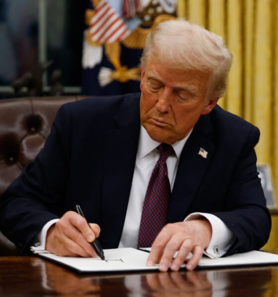 President Donald Trump signs executive orders in the Oval Office of the White House on Jan. 20, 2025, in Washington, D.C.  (Photo by Anna Moneymaker/Getty Images)