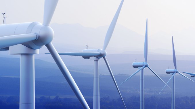 wind turbines with mountain in background