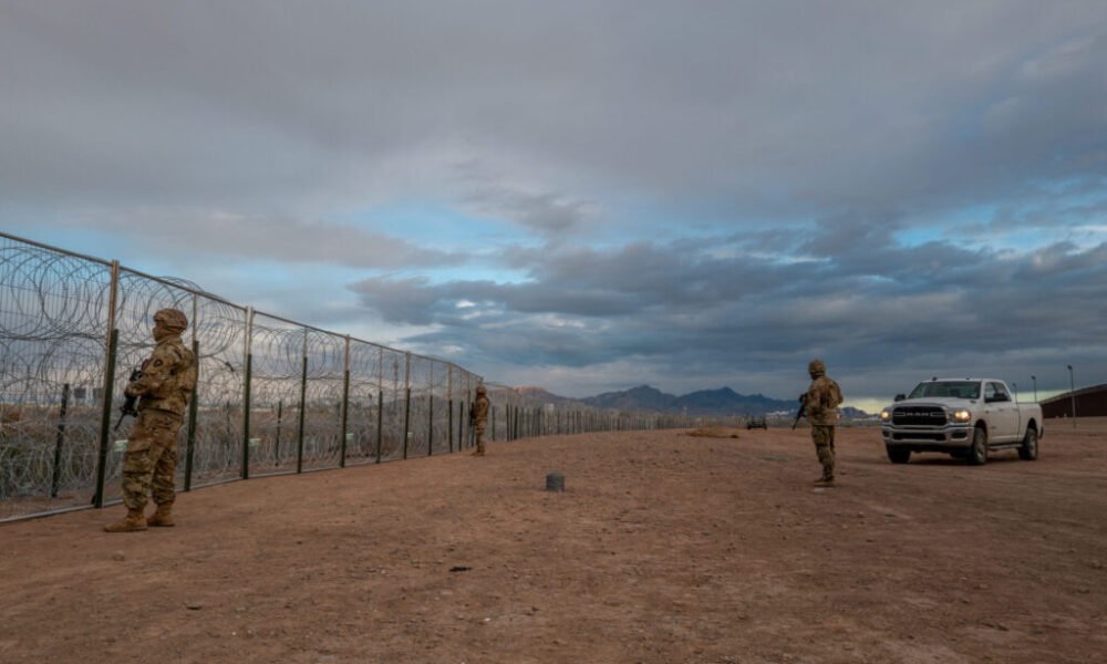 Texas National Guard soldiers stand on patrol near the banks of the Rio Grande on April 2, 2024 in El Paso, Texas. (Photo by Brandon Bell/Getty Images)