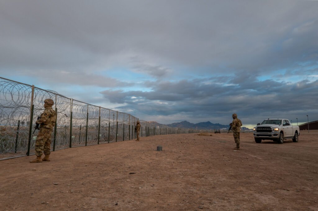 Texas National Guard soldiers stand on patrol near the banks of the Rio Grande on April 2, 2024 in El Paso, Texas. (Photo by Brandon Bell/Getty Images)