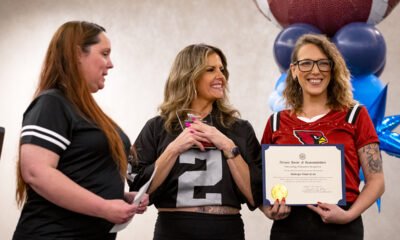 Tonya Thompson (center) holds the Pillar of the Business Community award from the Maricopa Chamber of Commerce with a colleague on Jan. 25, 2025. [Monica D. Spencer]