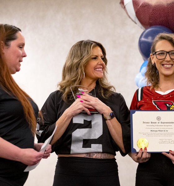 Tonya Thompson (center) holds the Pillar of the Business Community award from the Maricopa Chamber of Commerce with a colleague on Jan. 25, 2025. [Monica D. Spencer]