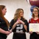 Tonya Thompson (center) holds the Pillar of the Business Community award from the Maricopa Chamber of Commerce with a colleague on Jan. 25, 2025. [Monica D. Spencer]